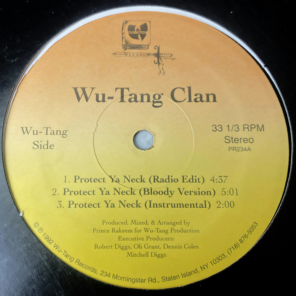 The original “Protect Ya Neck” b/w “After the Laughter Comes Tears” single with Allah Mathematics’ hand-drawn logo and RZA’s Morningstar Road address printed on the label.